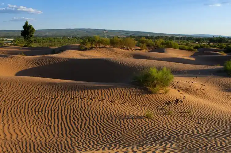 塔克拉玛干沙漠|如果塔克拉玛干沙漠变成草原的话,会对中国气候有什么