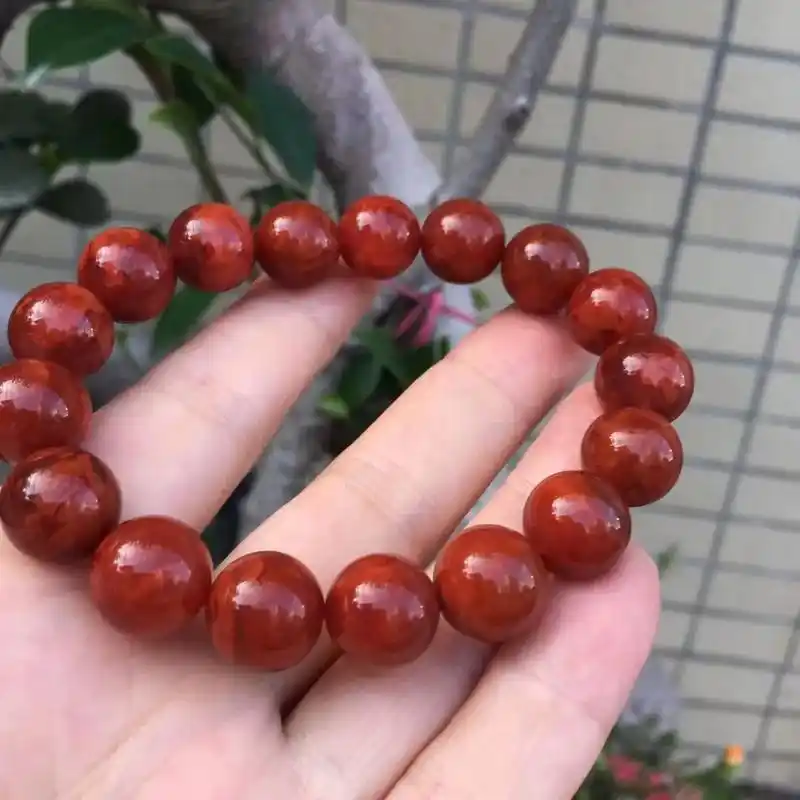 凉山南红圆珠手串,柿子红带火焰97纹,色红润度一流,尺寸11 - 抖音