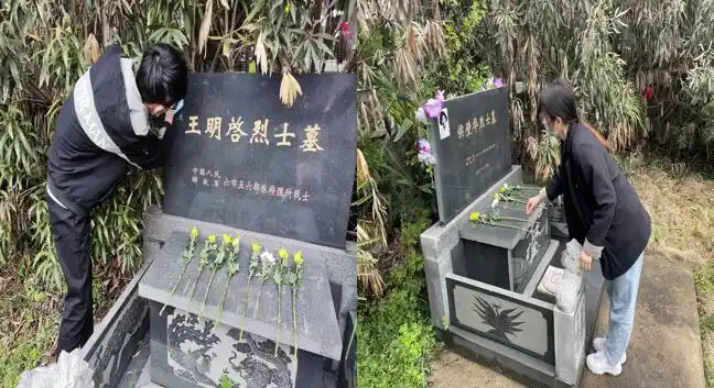 们无比崇敬的心情走入革命烈士公墓区,清扫革命烈士公墓四周的落叶