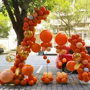门店开业橙色气球装饰商场周年庆典活动布置婚纱摄影背景橘色系