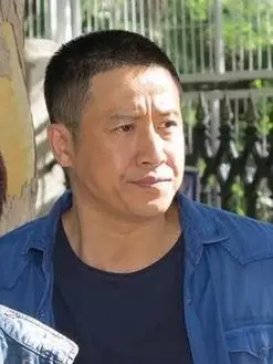 段虎(张国强饰演)