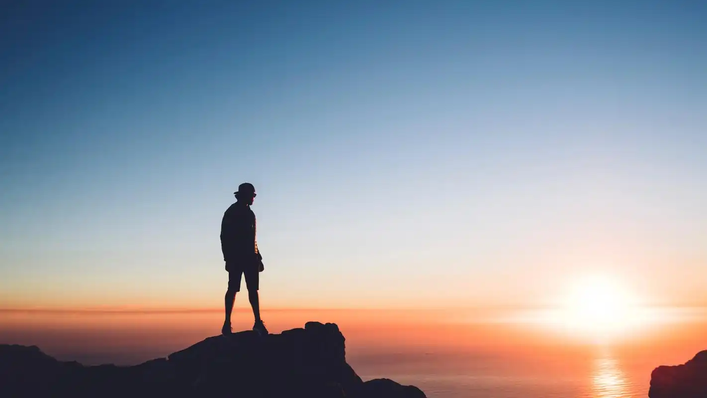 壁纸 男人,岩石,海,日落 3840x2160 uhd 4k 高清壁纸, 图片, 照片
