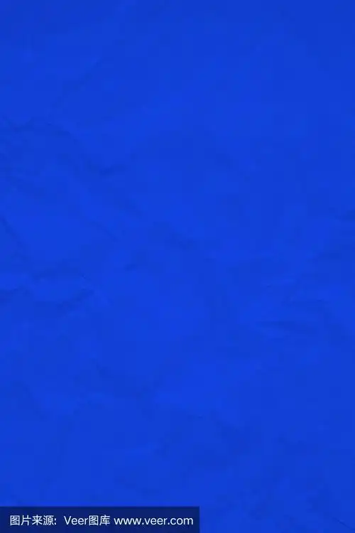 深蓝色皱皱纹理纸背景.