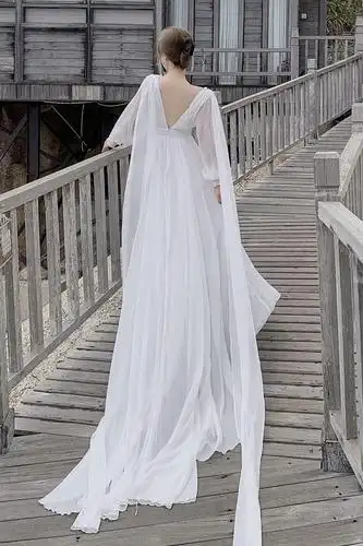 海边旅拍超仙长袖度假裙白色雪纺露背拖尾飘逸沙滩裙大摆长裙